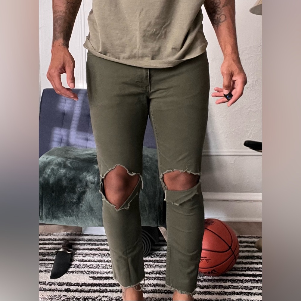 Ripped H&M jeans.